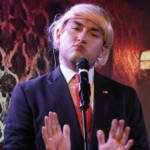 Comedian performing stand-up on stage at Madrid Comedy Festival