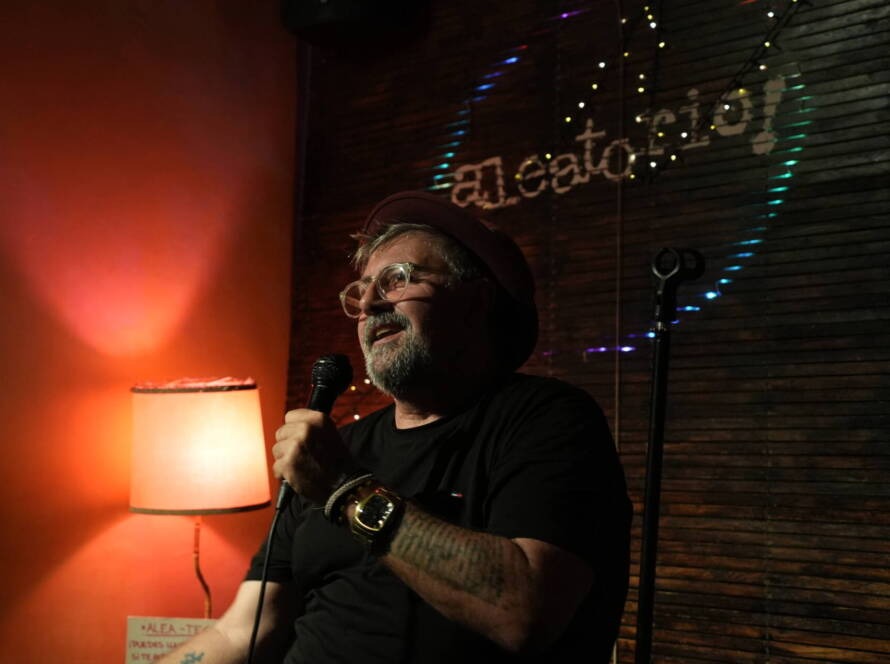 Stand-up comedian on stage at a Madrid comedy show in October