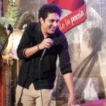 Comedian performing stand-up on stage at Madrid Comedy Festival