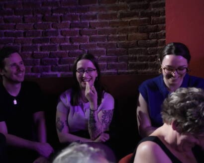 Comedian performing stand-up on stage at Madrid Comedy Festival