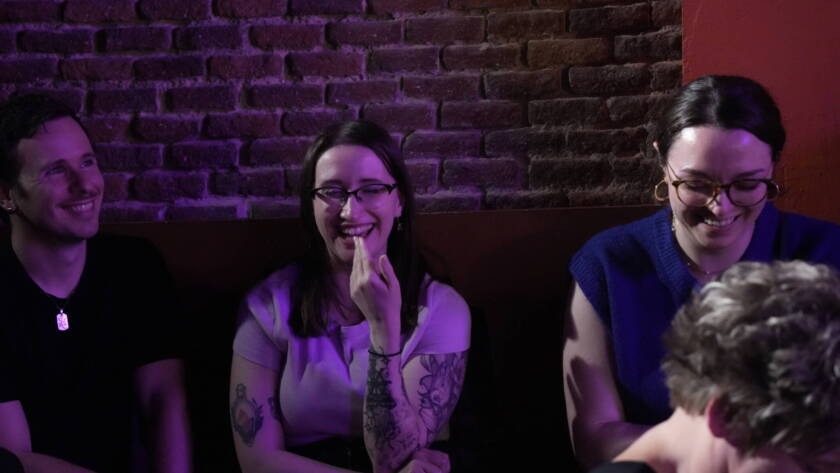 Comedian performing stand-up on stage at Madrid Comedy Festival