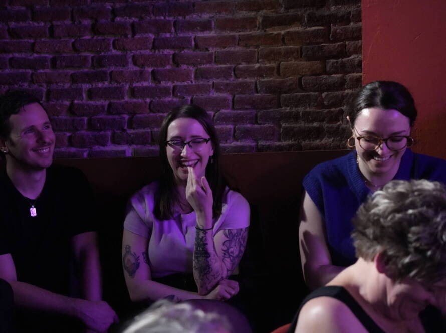Comedian performing stand-up on stage at Madrid Comedy Festival