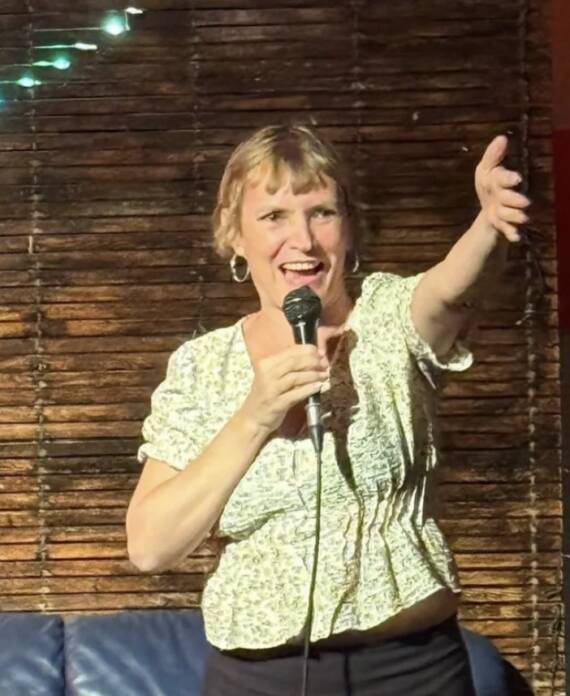 Comedian on stage during a comedy night at Madrid Comedy Festival