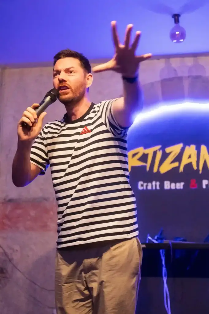 Comedian performing at the Closing Gala at Artizanale, Madrid Comedy Festival 2026