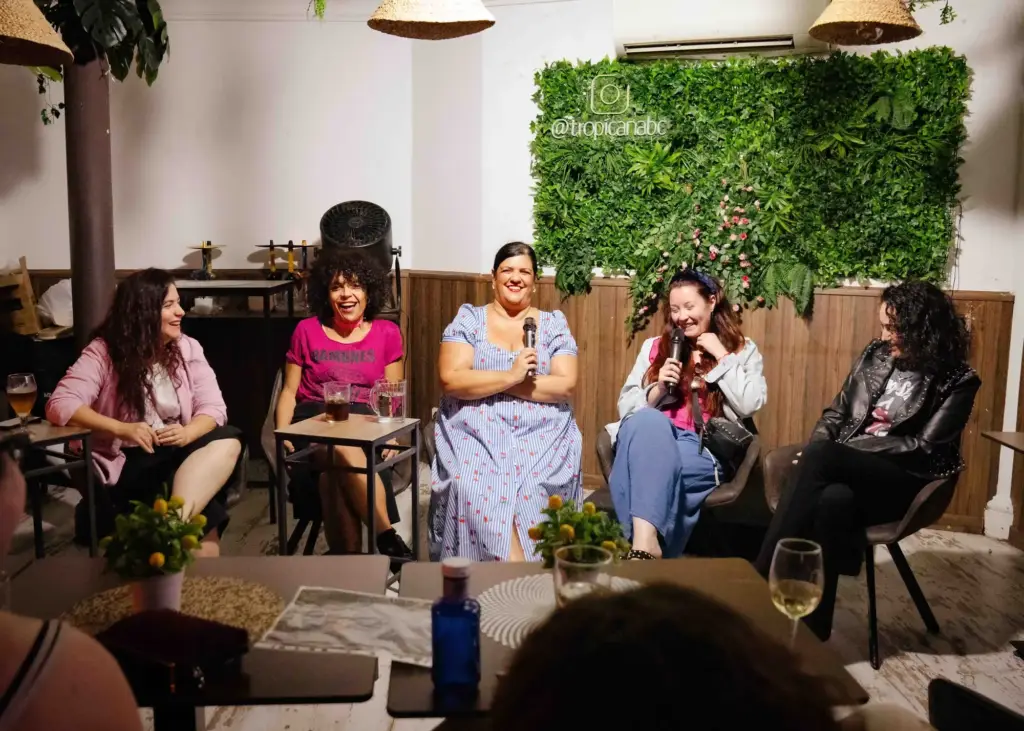 Five performers sitting on stage at Tropicana during Madrid Comedy Festival 2026